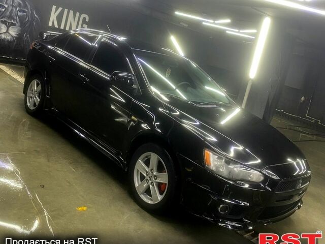 Чорний Міцубісі Lancer, об'ємом двигуна 2 л та пробігом 126 тис. км за 5800 $, фото 1 на Automoto.ua
