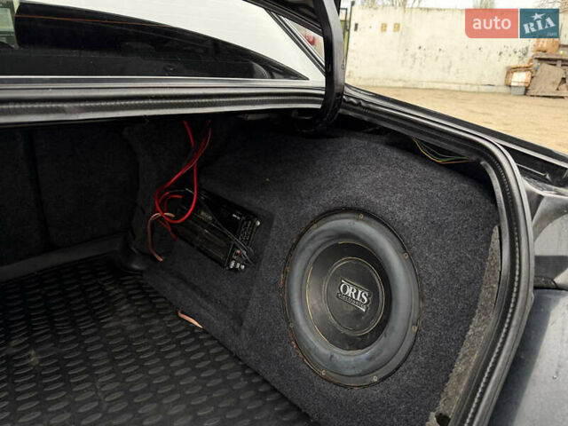 Черный Мицубиси Лансер, объемом двигателя 1.58 л и пробегом 249 тыс. км за 5499 $, фото 14 на Automoto.ua