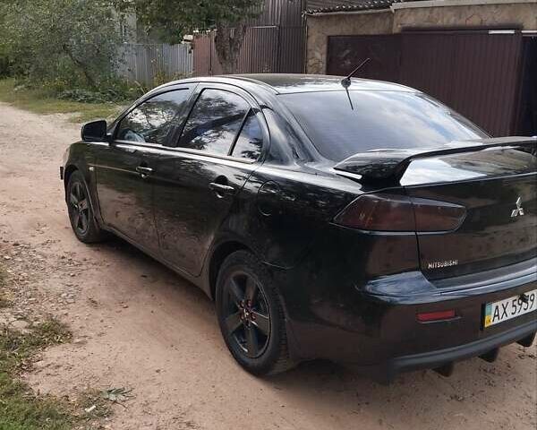 Чорний Міцубісі Lancer, об'ємом двигуна 1.5 л та пробігом 210 тис. км за 5800 $, фото 9 на Automoto.ua