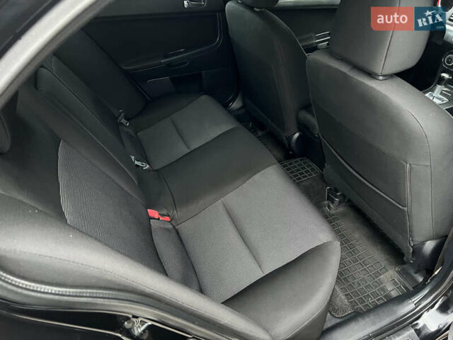 Чорний Міцубісі Lancer, об'ємом двигуна 2 л та пробігом 216 тис. км за 7150 $, фото 7 на Automoto.ua