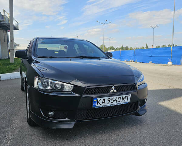 Чорний Міцубісі Lancer, об'ємом двигуна 2 л та пробігом 249 тис. км за 6500 $, фото 4 на Automoto.ua