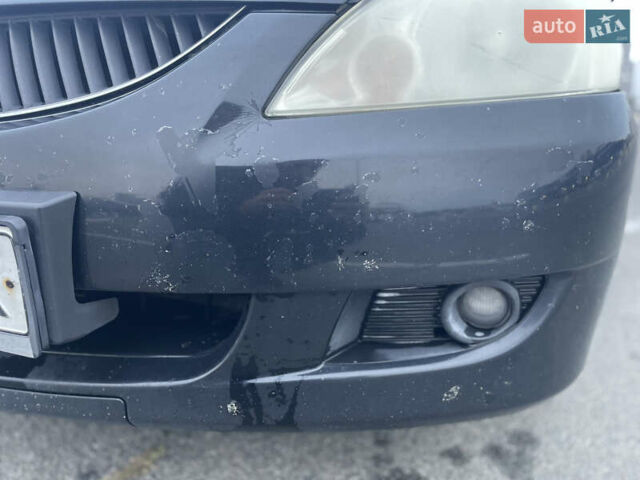 Міцубісі Lancer 2008 у Києві на Automoto.ua Чорний Міцубісі Lancer, об'ємом двигуна 1.58 л та пробігом 300 тис. км за 3800 $, фото 3 на Automoto.ua