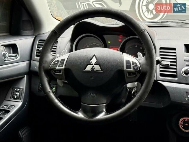 Чорний Міцубісі Lancer, об'ємом двигуна 2 л та пробігом 118 тис. км за 6200 $, фото 13 на Automoto.ua