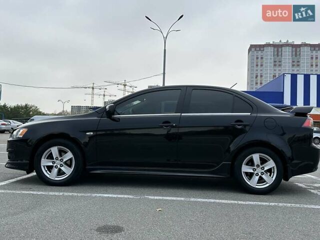 Чорний Міцубісі Lancer, об'ємом двигуна 2 л та пробігом 199 тис. км за 7900 $, фото 4 на Automoto.ua