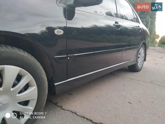 Черный Мицубиси Лансер, объемом двигателя 1.58 л и пробегом 216 тыс. км за 4950 $, фото 9 на Automoto.ua