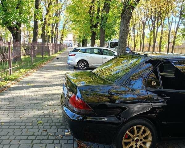 Мицубиси Лансер 2008 в Львове на Automoto.ua Черный Мицубиси Лансер, объемом двигателя 1.58 л и пробегом 200 тыс. км за 5200 $, фото 8 на Automoto.ua
