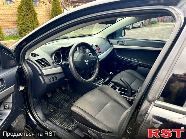 Чорний Міцубісі Lancer, об'ємом двигуна 1.5 л та пробігом 196 тис. км за 5900 $, фото 7 на Automoto.ua