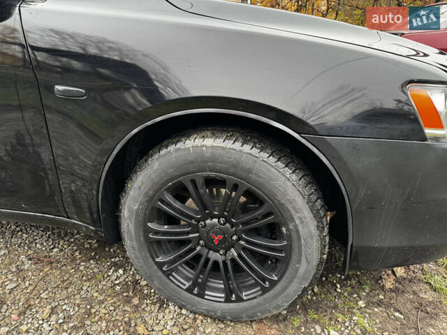 Черный Мицубиси Лансер, объемом двигателя 1.5 л и пробегом 278 тыс. км за 4200 $, фото 6 на Automoto.ua