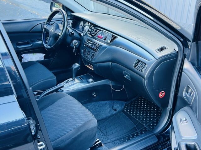 Міцубісі Lancer 2008 у Синельниковом на Automoto.ua Чорний Міцубісі Lancer, об'ємом двигуна 1.6 л та пробігом 230 тис. км за 4500 $, фото 16 на Automoto.ua