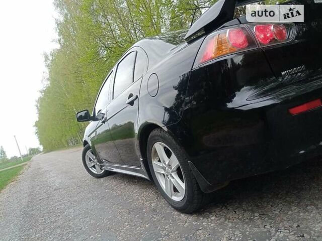 Чорний Міцубісі Lancer, об'ємом двигуна 2 л та пробігом 170 тис. км за 7600 $, фото 4 на Automoto.ua