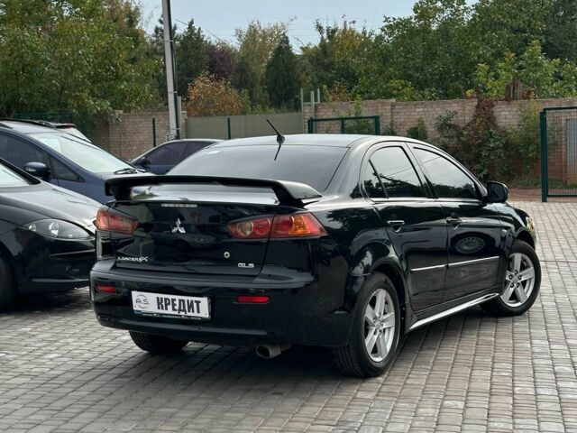 Чорний Міцубісі Lancer, об'ємом двигуна 2 л та пробігом 239 тис. км за 6900 $, фото 2 на Automoto.ua
