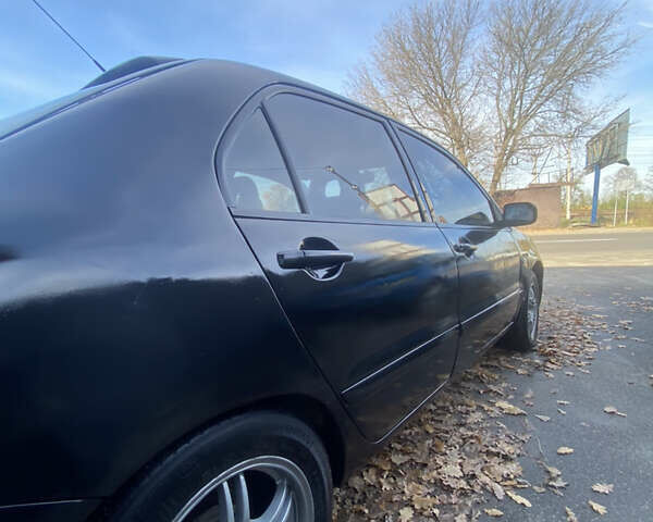 Мицубиси Лансер 2008 в Киеве на Automoto.ua Черный Мицубиси Лансер, объемом двигателя 1.6 л и пробегом 72 тыс. км за 2650 $, фото 4 на Automoto.ua