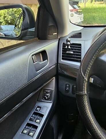 Черный Мицубиси Лансер, объемом двигателя 1.5 л и пробегом 205 тыс. км за 6300 $, фото 14 на Automoto.ua