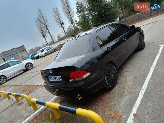 Мицубиси Лансер 2008 в Львове на Automoto.ua Черный Мицубиси Лансер, объемом двигателя 1.58 л и пробегом 200 тыс. км за 5200 $, фото 56 на Automoto.ua