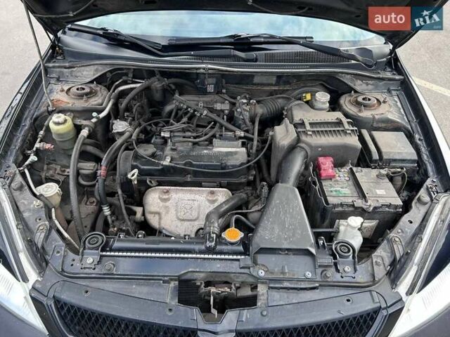 Чорний Міцубісі Lancer, об'ємом двигуна 1.6 л та пробігом 310 тис. км за 3500 $, фото 37 на Automoto.ua