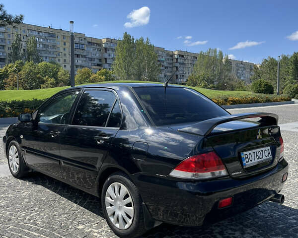 Мицубиси Лансер 2008 в Днепре (Днепропетровске) на Automoto.ua Черный Мицубиси Лансер, объемом двигателя 1.6 л и пробегом 230 тыс. км за 4999 $, фото 5 на Automoto.ua