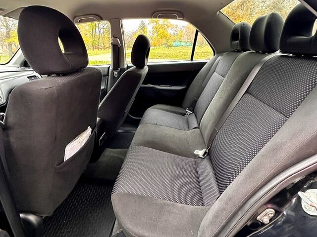 Черный Мицубиси Лансер, объемом двигателя 1.6 л и пробегом 185 тыс. км за 5500 $, фото 6 на Automoto.ua