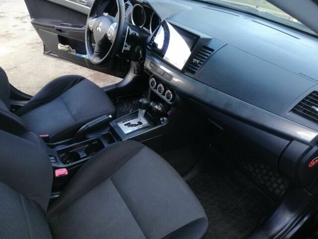 Міцубісі Lancer 2008 у Києві на Automoto.ua Чорний Міцубісі Lancer, об'ємом двигуна 2 л та пробігом 196 тис. км за 5500 $, фото 16 на Automoto.ua