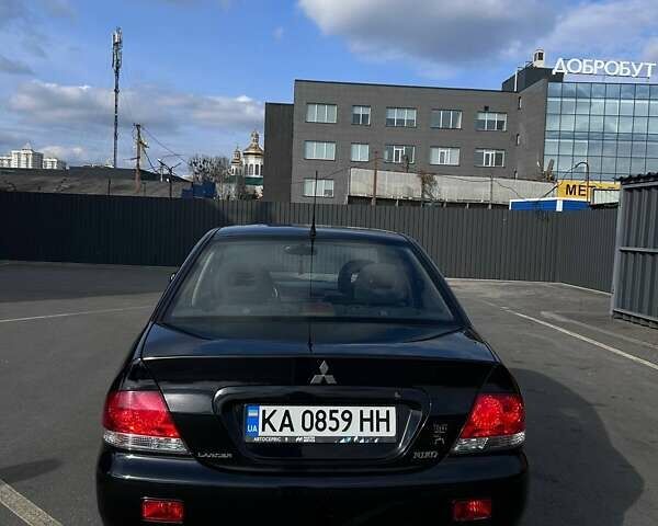 Чорний Міцубісі Lancer, об'ємом двигуна 1.6 л та пробігом 310 тис. км за 3500 $, фото 9 на Automoto.ua