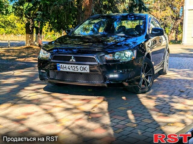 Черный Мицубиси Лансер, объемом двигателя 1.5 л и пробегом 235 тыс. км за 5250 $, фото 2 на Automoto.ua
