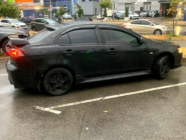 Черный Мицубиси Лансер, объемом двигателя 1.5 л и пробегом 250 тыс. км за 3800 $, фото 5 на Automoto.ua