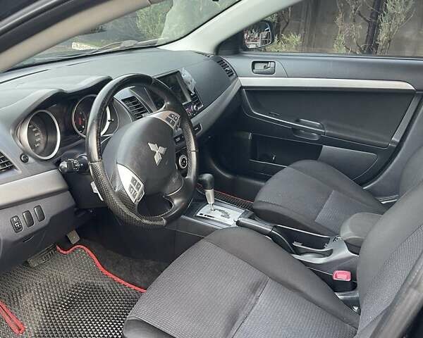 Чорний Міцубісі Lancer, об'ємом двигуна 2 л та пробігом 217 тис. км за 5600 $, фото 11 на Automoto.ua