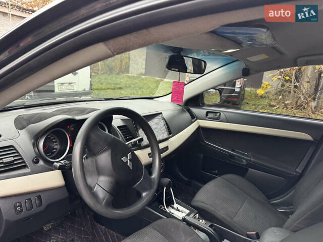 Черный Мицубиси Лансер, объемом двигателя 1.5 л и пробегом 278 тыс. км за 4200 $, фото 11 на Automoto.ua