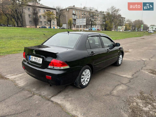 Чорний Міцубісі Lancer, об'ємом двигуна 1.6 л та пробігом 200 тис. км за 4500 $, фото 8 на Automoto.ua
