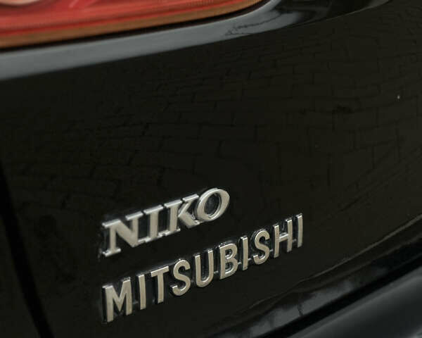 Чорний Міцубісі Lancer, об'ємом двигуна 1.5 л та пробігом 111 тис. км за 6999 $, фото 18 на Automoto.ua