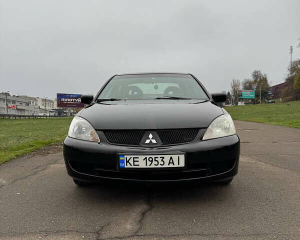 Чорний Міцубісі Lancer, об'ємом двигуна 1.6 л та пробігом 200 тис. км за 4500 $, фото 3 на Automoto.ua