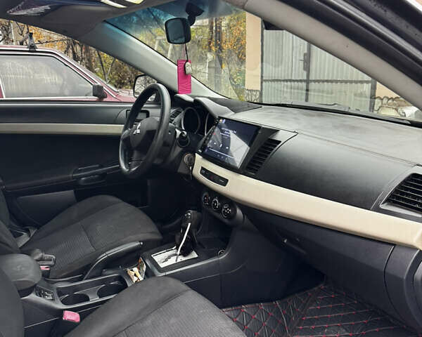 Черный Мицубиси Лансер, объемом двигателя 1.5 л и пробегом 278 тыс. км за 4200 $, фото 4 на Automoto.ua