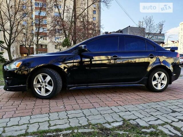 Чорний Міцубісі Lancer, об'ємом двигуна 2 л та пробігом 182 тис. км за 7650 $, фото 11 на Automoto.ua