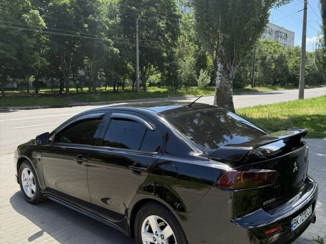 Чорний Міцубісі Lancer, об'ємом двигуна 2 л та пробігом 163 тис. км за 8000 $, фото 2 на Automoto.ua
