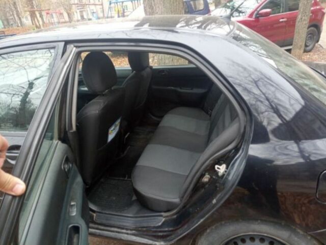 Черный Мицубиси Лансер, объемом двигателя 6 л и пробегом 190 тыс. км за 4500 $, фото 1 на Automoto.ua