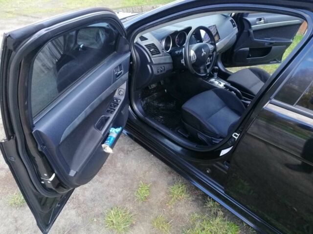 Міцубісі Lancer 2008 у Києві на Automoto.ua Чорний Міцубісі Lancer, об'ємом двигуна 2 л та пробігом 196 тис. км за 5500 $, фото 12 на Automoto.ua