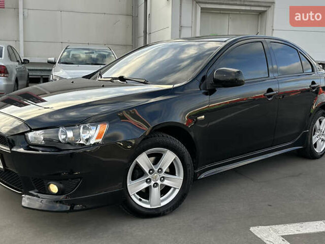 Чорний Міцубісі Lancer, об'ємом двигуна 2 л та пробігом 290 тис. км за 5900 $, фото 2 на Automoto.ua