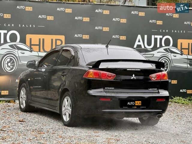 Чорний Міцубісі Lancer, об'ємом двигуна 2 л та пробігом 118 тис. км за 6200 $, фото 4 на Automoto.ua
