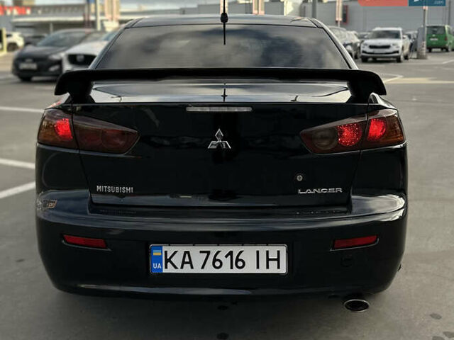 Чорний Міцубісі Lancer, об'ємом двигуна 2 л та пробігом 290 тис. км за 5900 $, фото 12 на Automoto.ua