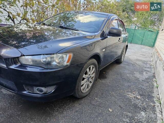 Мицубиси Лансер 2008 в Добровеличковке на Automoto.ua Черный Мицубиси Лансер, объемом двигателя 1.5 л и пробегом 175 тыс. км за 5500 $, фото 9 на Automoto.ua