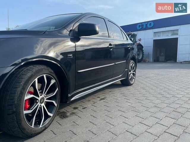Чорний Міцубісі Lancer, об'ємом двигуна 2 л та пробігом 278 тис. км за 6600 $, фото 4 на Automoto.ua