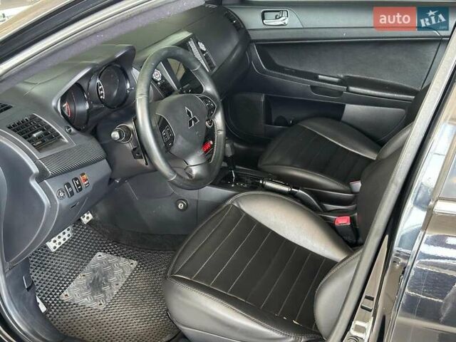 Чорний Міцубісі Lancer, об'ємом двигуна 2 л та пробігом 313 тис. км за 7690 $, фото 8 на Automoto.ua
