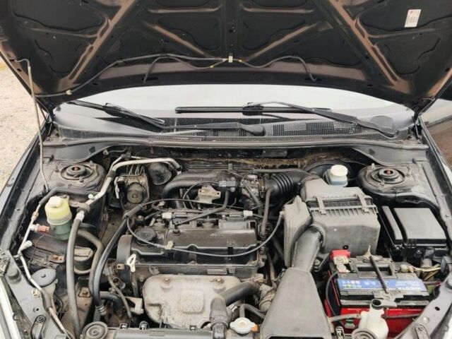 Чорний Міцубісі Lancer, об'ємом двигуна 1.6 л та пробігом 257 тис. км за 4200 $, фото 6 на Automoto.ua