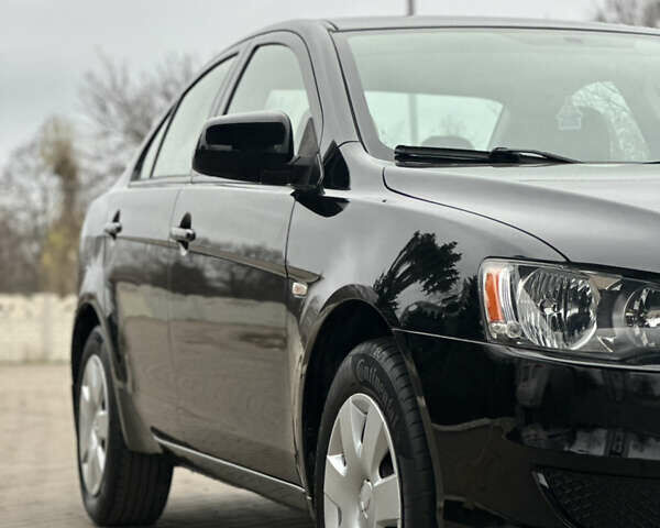 Чорний Міцубісі Lancer, об'ємом двигуна 1.5 л та пробігом 111 тис. км за 6999 $, фото 6 на Automoto.ua