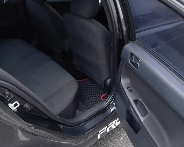 Чорний Міцубісі Lancer, об'ємом двигуна 2 л та пробігом 275 тис. км за 5200 $, фото 12 на Automoto.ua