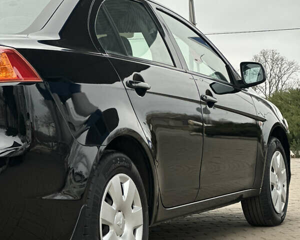 Чорний Міцубісі Lancer, об'ємом двигуна 1.5 л та пробігом 111 тис. км за 6999 $, фото 10 на Automoto.ua