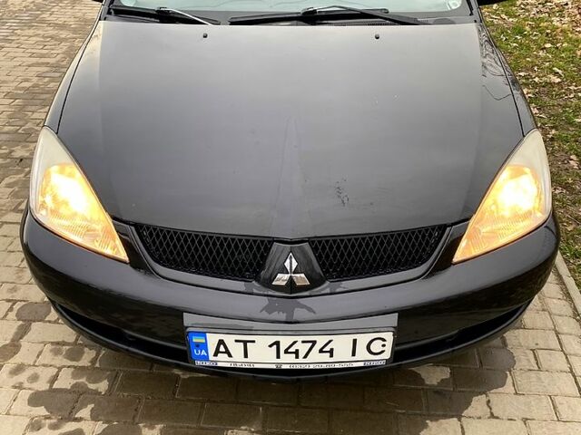 Черный Мицубиси Лансер, объемом двигателя 1.6 л и пробегом 240 тыс. км за 4200 $, фото 6 на Automoto.ua
