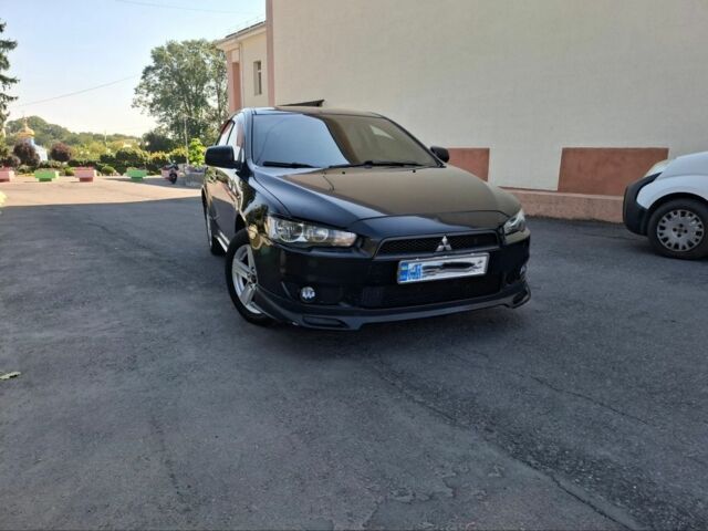 Чорний Міцубісі Lancer, об'ємом двигуна 2 л та пробігом 230 тис. км за 6650 $, фото 1 на Automoto.ua