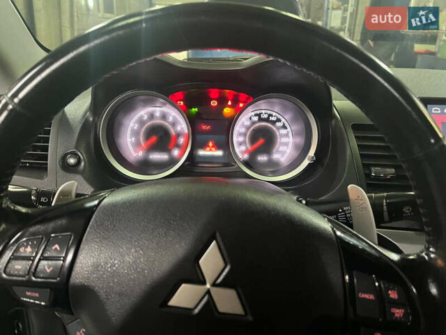 Черный Мицубиси Лансер, объемом двигателя 2 л и пробегом 200 тыс. км за 8000 $, фото 9 на Automoto.ua