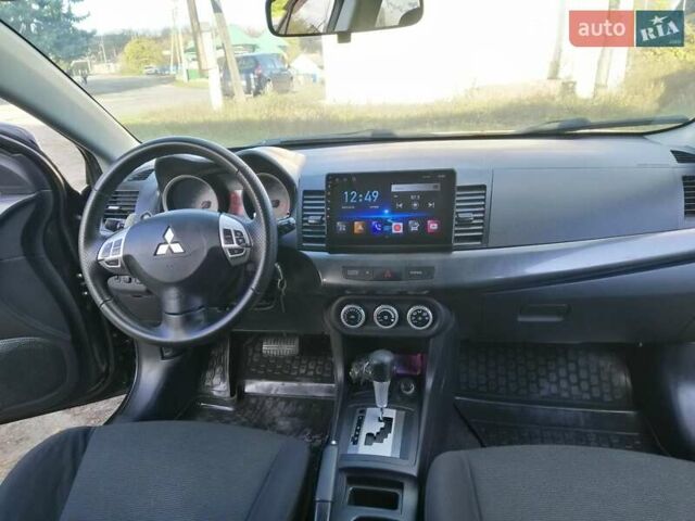 Мицубиси Лансер 2008 в Киеве на Automoto.ua Черный Мицубиси Лансер, объемом двигателя 2 л и пробегом 196 тыс. км за 5500 $, фото 26 на Automoto.ua