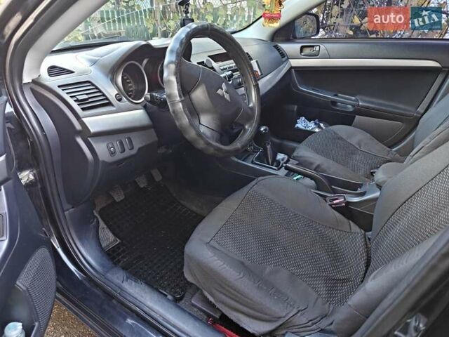 Мицубиси Лансер 2008 в Добровеличковке на Automoto.ua Черный Мицубиси Лансер, объемом двигателя 1.5 л и пробегом 175 тыс. км за 5500 $, фото 3 на Automoto.ua